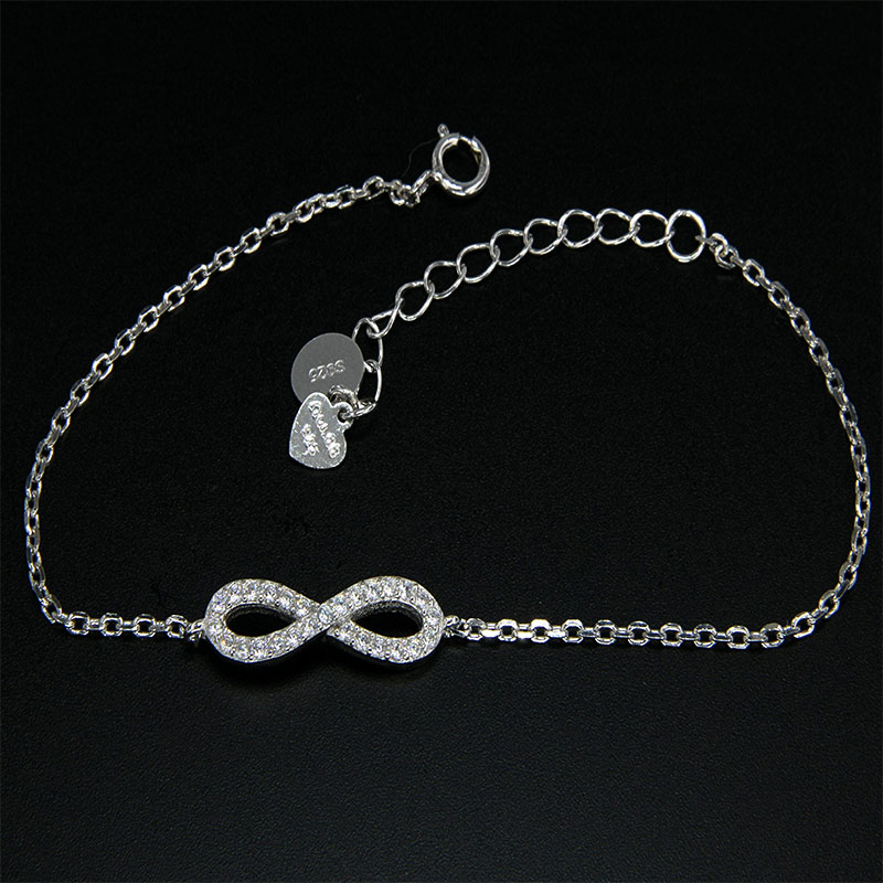 Womens 925 ° silver bracelet in infinity shape decorated with white zircons.