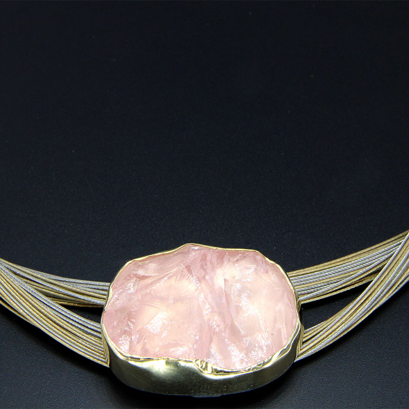 Womens handmade silver and gold pendant made of 925 ° Silver & K18 Gold with natural raw Rose Quartz.