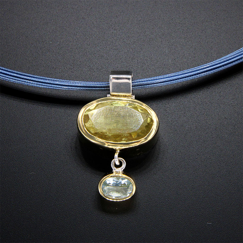 Womens handmade silver and gold pendant made of 925 ° Silver & K18 Gold with natural lemon quartz and natural Aquamarine.