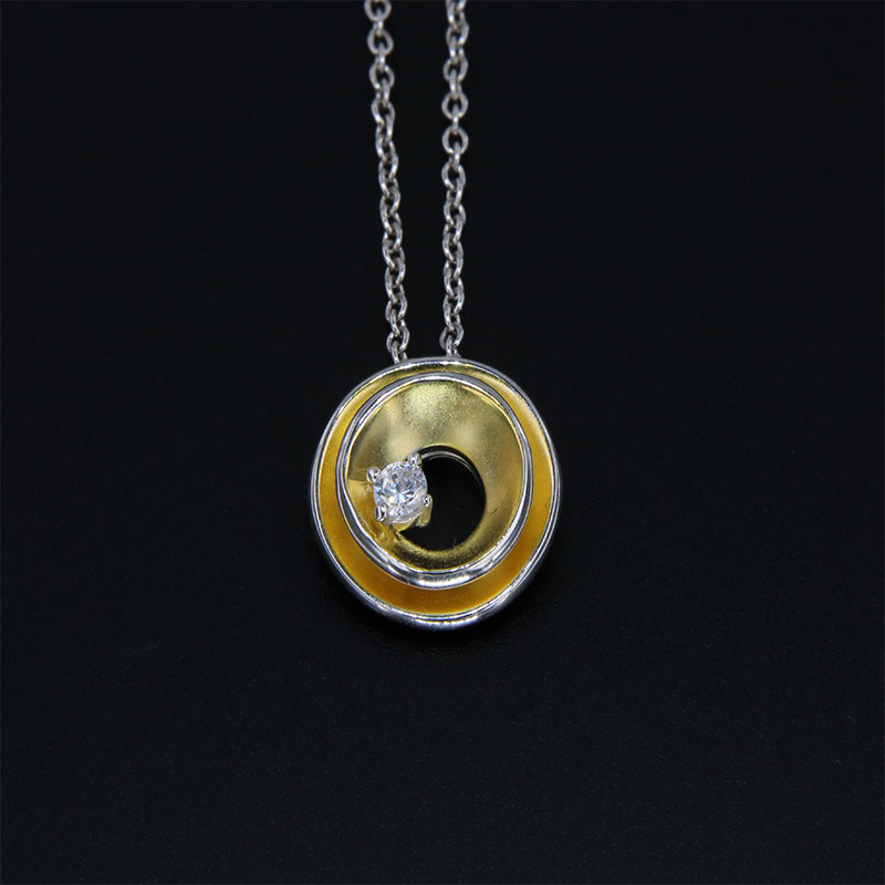 Womens silver two-tone pendant with chain 925 ° decorated with white zircon.