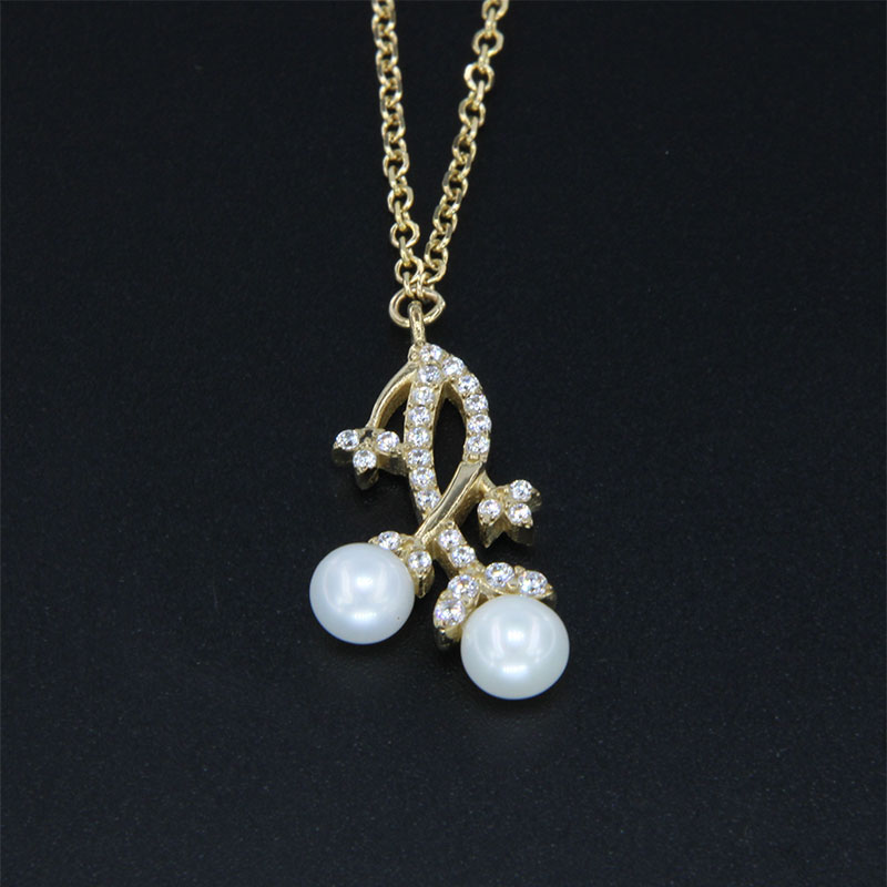 Womens gold pendant with K9 chain with white zircons and natural pearls