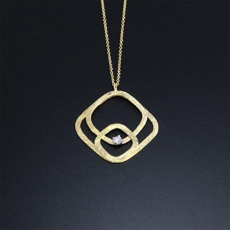 Womens handmade gold K14 pendant with chain and special diamond treatment decorated with white zircon.