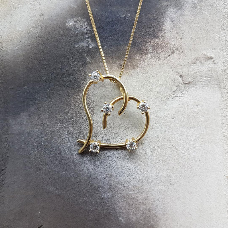 Womens handmade gold pendant with square chain K14 in the shape of a heart decorated with white zircons.