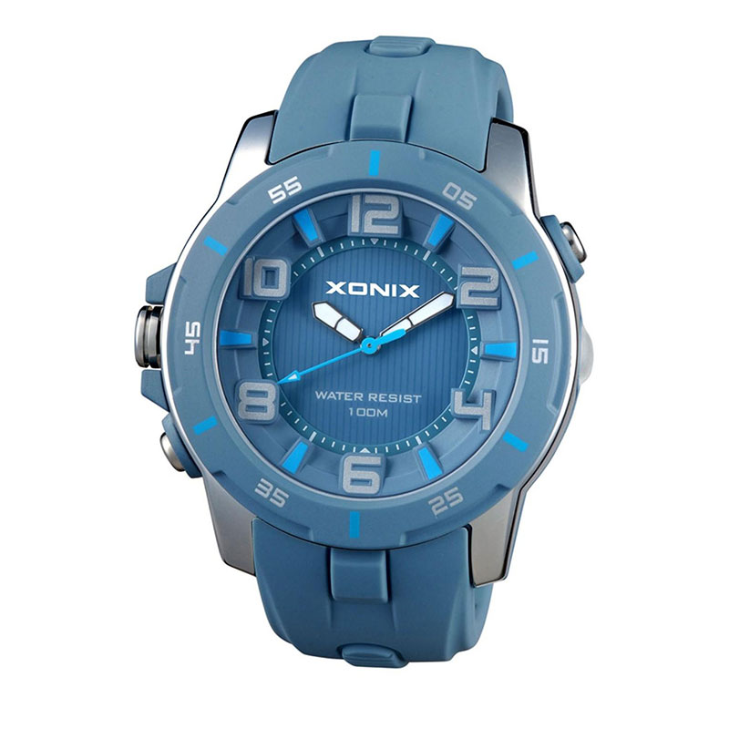 Ανδρικό ρολόι Xonix αδιάβροχο στα 100 m, με ανοιχτό μπλε λουράκι από σιλικόνη.