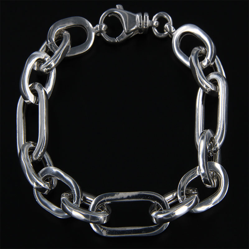 Womens 925 ° silver bracelet with oval polished rings and safety clasp.