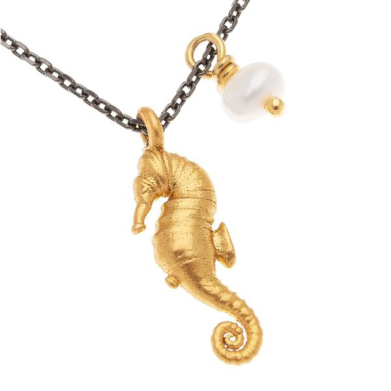 925 ° Sterling Silver Necklace with Black Platinum Chain and Dangling Yellow Seahorse with Pearl on the Side.