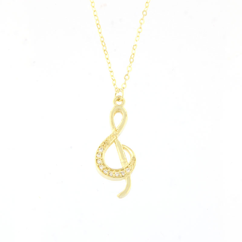 Womens gold pendant with a treble clef and a 9K chain decorated with white zircons. 