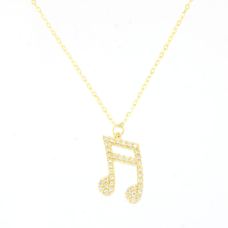 Womens gold pendant with a 9K note and a 9K chain decorated with white zircons.