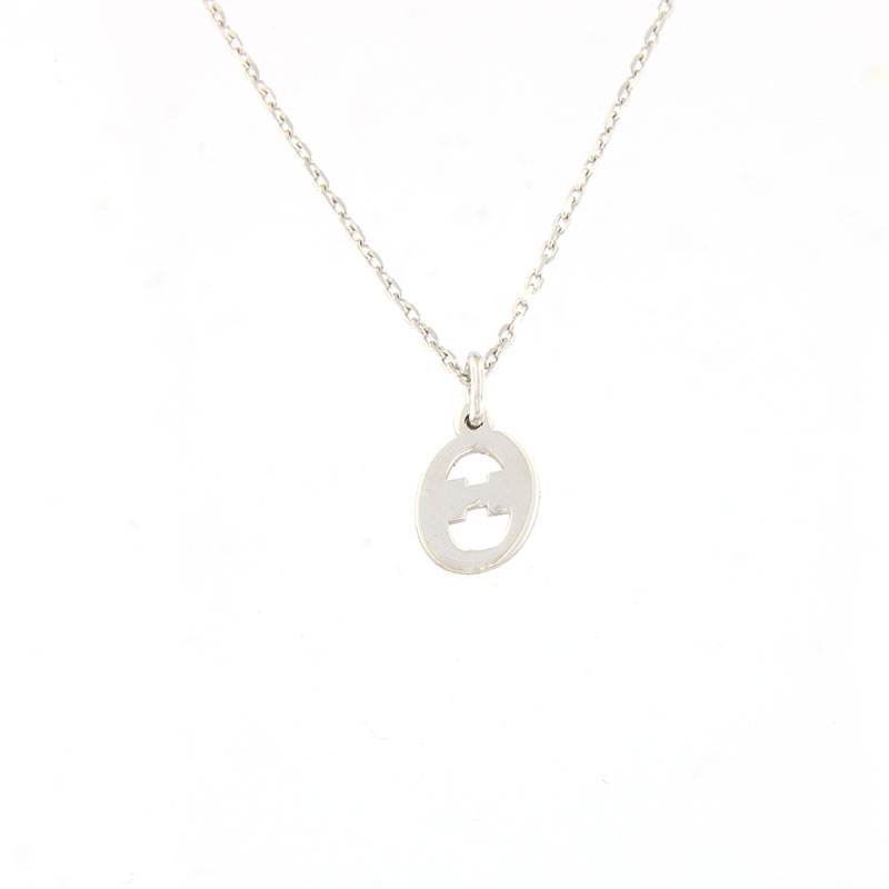 Womens silver monogram (Θ) with 925 chain.